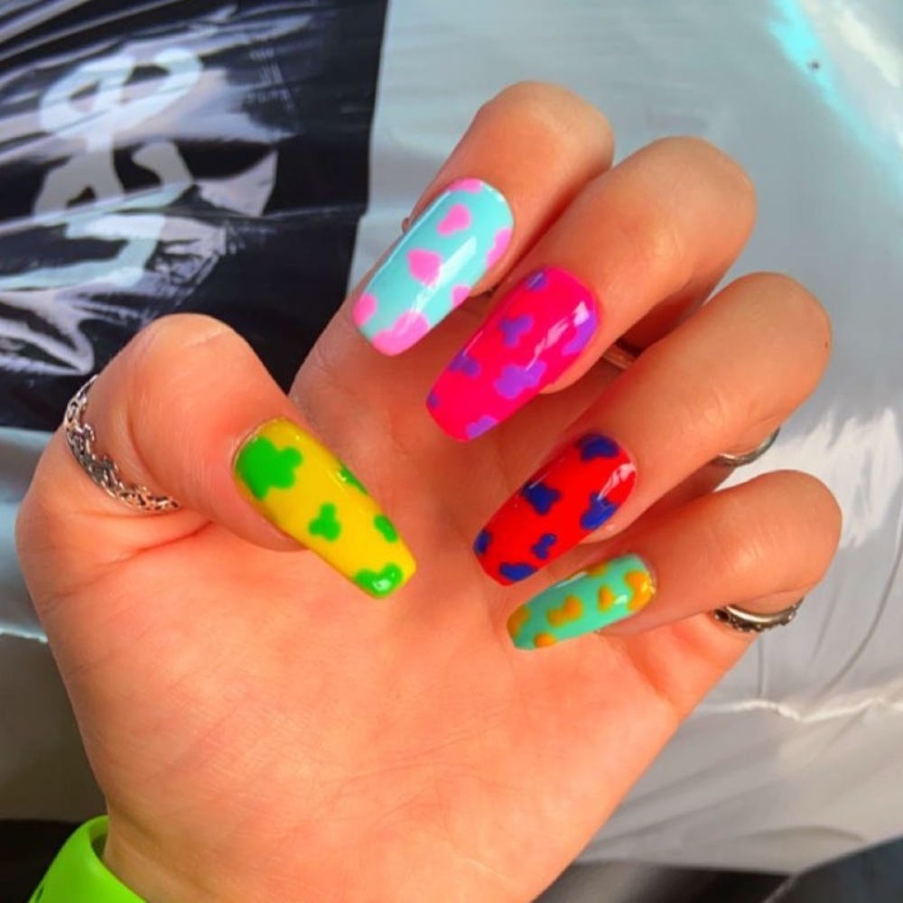 Custom and hand painted press on acrylic nails!! Please message me on Facebook!